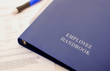 Handbook and paperwork for the newly hired.